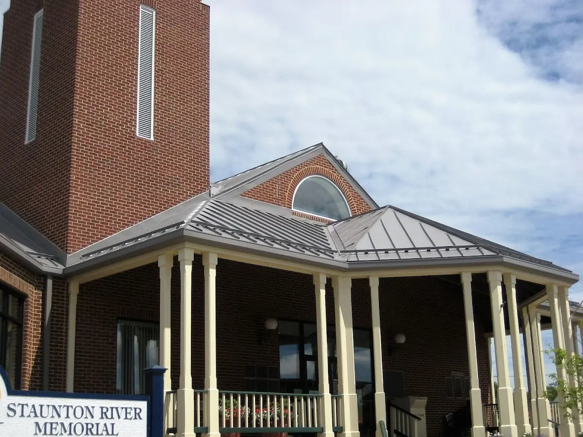 Skilled roofing craftsmen working on a residential roof in Spring Hope